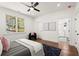 Bedroom featuring hardwood floors and lots of natural light from the large window at 1183 Mobile Nw St, Atlanta, GA 30314