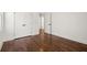 Bedroom with hardwood floors, closets and modern doors at 1183 Mobile Nw St, Atlanta, GA 30314