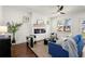 Bright and airy living room with a modern fireplace, hardwood floors, and ample natural light at 1183 Mobile Nw St, Atlanta, GA 30314