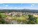 New construction homes, beautifully landscaped yards, and scenic views of lush green hills at 231 Laurel Vista Dr, Canton, GA 30114