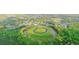 Aerial perspective of a new home community in a forest, showcasing roads and green spaces at 231 Laurel Vista Dr, Canton, GA 30114