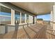 Covered back deck offers an open-air living space with large windows and natural light at 231 Laurel Vista Dr, Canton, GA 30114