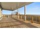 Wide back deck perfect for entertaining, with views of the surrounding forest at 231 Laurel Vista Dr, Canton, GA 30114