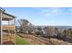 Backyard view showcasing the multi-level decks with stunning mountain views at 231 Laurel Vista Dr, Canton, GA 30114
