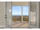 Inviting balcony with glass doors offering panoramic views of the mountains and sky at 231 Laurel Vista Dr, Canton, GA 30114