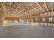 Unfinished basement interior with wood framing, insulation, and windows providing natural light at 231 Laurel Vista Dr, Canton, GA 30114