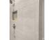 Modern tiled shower with a built-in niche and contemporary fixtures at 231 Laurel Vista Dr, Canton, GA 30114