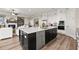 Gourmet kitchen featuring a large island, stainless steel appliances, and an open concept design at 231 Laurel Vista Dr, Canton, GA 30114