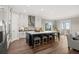 Spacious kitchen featuring an island with seating, stainless steel appliances and white cabinetry at 231 Laurel Vista Dr, Canton, GA 30114
