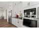 Kitchen appliances complemented by white cabinets and modern hardware at 231 Laurel Vista Dr, Canton, GA 30114