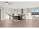 Open-concept kitchen with island, stainless steel appliances and plenty of cabinet space at 231 Laurel Vista Dr, Canton, GA 30114