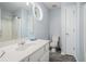 Bright bathroom featuring a round window and a single vanity sink at 2735 Snapfinger Mnr, Decatur, GA 30035