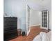 Bedroom showcasing hardwood floors, a closet, and light blue walls at 2735 Snapfinger Mnr, Decatur, GA 30035
