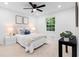 Inviting bedroom featuring a neutral color palette and a bright window view at 2849 Knotty Pine Ct, Buford, GA 30519