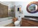 The bathroom has a tub and shower combination, granite countertops, and neutral colors at 351 Ne Washington Ne Ave # 307, Marietta, GA 30060