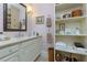 Bathroom featuring classic fixtures, ample counter space, and built-in storage at 351 Ne Washington Ne Ave # 307, Marietta, GA 30060