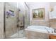 Well-appointed bathroom showcasing a tub, shower, and elegant fixtures at 351 Ne Washington Ne Ave # 307, Marietta, GA 30060