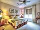 Cozy bedroom featuring a ceiling fan, neutral colors, and soft, natural light at 351 Ne Washington Ne Ave # 307, Marietta, GA 30060
