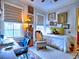Bright bedroom with a large windows and a comfortable chair at 351 Ne Washington Ne Ave # 307, Marietta, GA 30060
