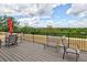 The patio with chairs, outdoor umbrella, and a beautiful view of green space at 351 Ne Washington Ne Ave # 307, Marietta, GA 30060