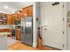Kitchen with stainless steel appliances, wooden cabinetry, and hardwood floors at 351 Ne Washington Ne Ave # 307, Marietta, GA 30060