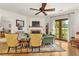 The living room offers a fireplace, comfortable seating, and an outside view from the doors to the balcony at 351 Ne Washington Ne Ave # 307, Marietta, GA 30060