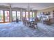 A spacious living room with a dining table, large windows, and an open floor plan at 351 Ne Washington Ne Ave # 307, Marietta, GA 30060