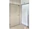 A storage unit with a metal door and a white roll-up door for secure storage at 351 Ne Washington Ne Ave # 307, Marietta, GA 30060