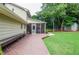 Spacious backyard featuring a deck, screened porch, and plenty of room for outdoor enjoyment at 1206 Tred Avon Sw Way, Lilburn, GA 30047