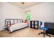 Bright bedroom with a cozy bed, natural light, and a functional layout at 1206 Tred Avon Sw Way, Lilburn, GA 30047