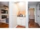 Convenient coffee bar nook featuring granite countertops and storage cabinets at 1206 Tred Avon Sw Way, Lilburn, GA 30047