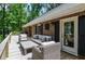 Relaxing outdoor deck area with comfortable wicker seating at 1216 Oleander Sw Dr, Lilburn, GA 30047