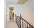 Upstairs hallway with access to attic at 1216 Oleander Sw Dr, Lilburn, GA 30047