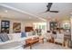 Spacious living room showcasing hardwood floors, comfortable seating, and an open layout at 1216 Oleander Sw Dr, Lilburn, GA 30047