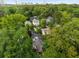 A neighborhood aerial view showcases mature trees and lush landscaping surrounding the homes at 132 East Ne Dr, Atlanta, GA 30305