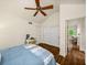 Comfortable bedroom with vaulted ceiling, fan, and hardwood floors at 132 East Ne Dr, Atlanta, GA 30305