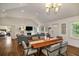 Open concept space with dining area, living room, and connection to a bedroom at 132 East Ne Dr, Atlanta, GA 30305