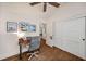 Well-lit office space with hardwood floors, white trim, and ceiling fan at 132 East Ne Dr, Atlanta, GA 30305
