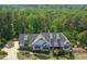 Aerial of beautiful home showing the front elevation and landscaping at 23 Sunset Se Rdg, Cartersville, GA 30121