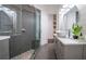 Contemporary bathroom boasting a glass-enclosed shower with a built-in bench and a stylish vanity with a vessel sink at 23 Sunset Se Rdg, Cartersville, GA 30121