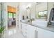Bright bathroom features a walk-in shower, dual sinks, white cabinets, and granite countertops at 23 Sunset Se Rdg, Cartersville, GA 30121