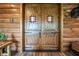 Front entryway with large wood doors and rustic log cabin interior design at 23 Sunset Se Rdg, Cartersville, GA 30121