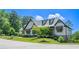 Charming curb appeal with lush landscaping and a well-maintained lawn, making it feel like home from the first glance at 23 Sunset Se Rdg, Cartersville, GA 30121