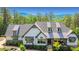 Craftsman home featuring a manicured lawn and mountain views at 23 Sunset Se Rdg, Cartersville, GA 30121