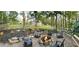 Panoramic view of an inviting firepit surrounded by landscaped grounds with plenty of seating at 23 Sunset Se Rdg, Cartersville, GA 30121