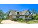 Spacious two-car garage, offering ample parking and storage space, with expertly manicured lawn and shrubbery at 23 Sunset Se Rdg, Cartersville, GA 30121