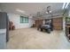 Spacious three car garage with ample storage and lighting at 23 Sunset Se Rdg, Cartersville, GA 30121
