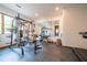 Home gym with weight training equipment, a large mirror, and durable flooring at 23 Sunset Se Rdg, Cartersville, GA 30121