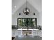 Bright kitchen with natural light, vaulted ceiling, stainless appliances, storage and island with seating at 23 Sunset Se Rdg, Cartersville, GA 30121