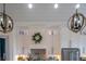 Charming kitchen featuring custom cabinets, stainless steel appliances, and decorative pendant lighting fixtures at 23 Sunset Se Rdg, Cartersville, GA 30121